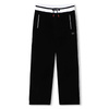 HUGO Girls' Velvet trousers, black  Polyester/elastane velvet jogging pants, metal «HUGO» plaque on the side, piped pockets, piping on the sides, striped ribbing at the waist with drawstrings maschine wash at 30*